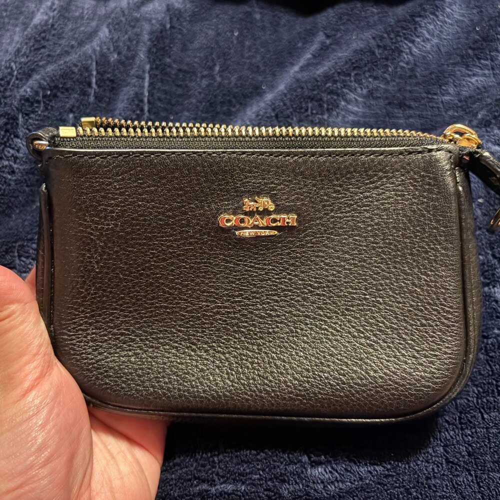 Coach mini pouch with 2 card slots inside. Black and gold accents.